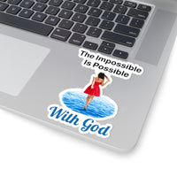 Large vinyl sticker with “Impossible Woman” design, message “The Impossible Is Possible with God,” glossy finish, inspirational sticker for adventurous women to make the impossible their reality, 4-inch sticker on laptop