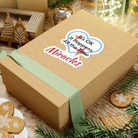 Large vinyl sticker with “Miracles Happen” design, message “It’s OK. It Happens All the Time – Miracles,” glossy finish, faith-based sticker are daily reminders of God’s tangible goodness, 4-inch sticker on gift box
