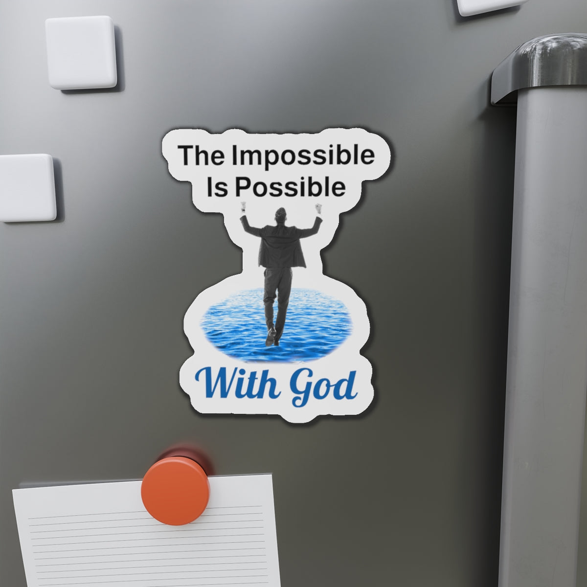 Vinyl die-cut magnet with "Impossible Man" design, message “The Impossible Is Possible with God,” durable matte finish, spiritual magnet for men walking in faith for impossible things, 6-inch magnet on fridge