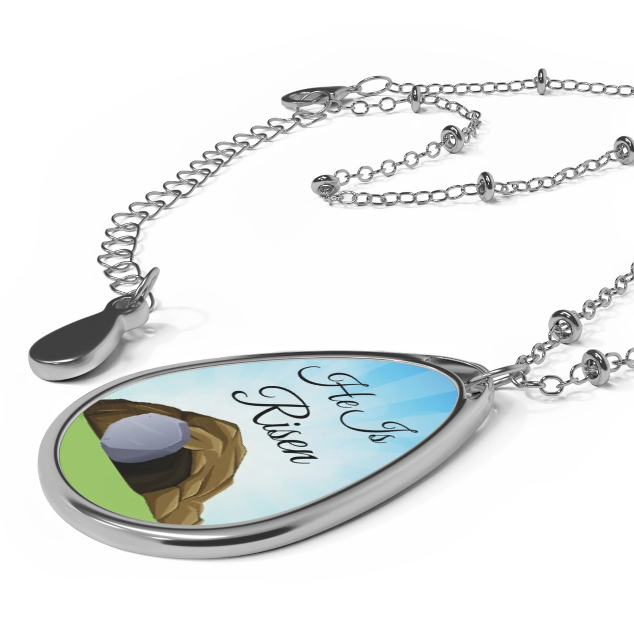 Inspirational oval pendant necklace with "He Is Risen" design,  empty grave artwork, zinc alloy and white aluminum, spiritual jewelry for resurrection faith, pendant with necklace