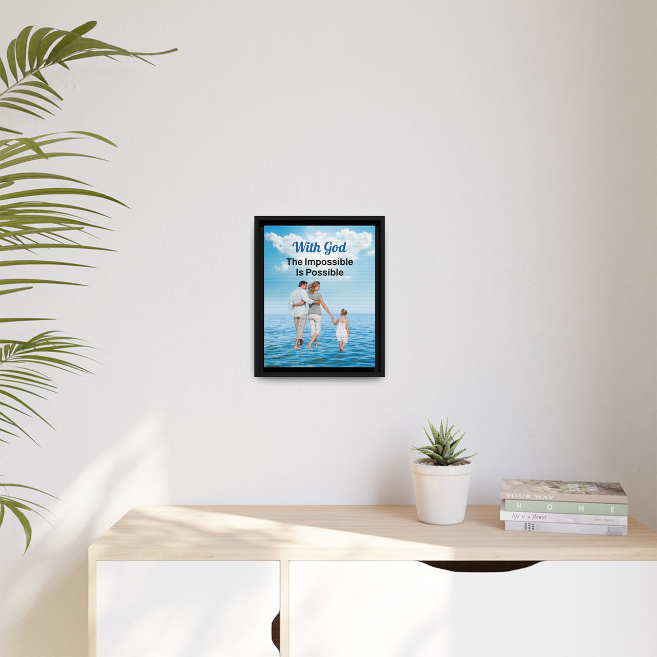Framed canvas wall art with “Impossible Family” design, family walking on water with message "With God, The Impossible Is Possible," inspirational home décor, black pinewood frame, ready to hang, 11x14 framed wall art on wall