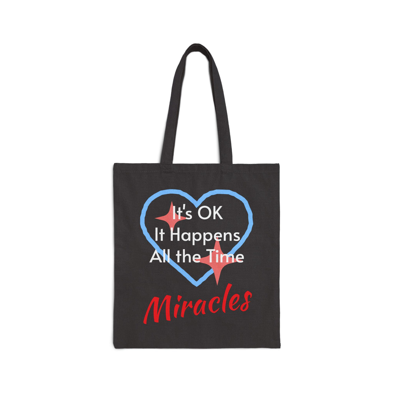 Cotton canvas tote bag with "Miracles Happen" design, message “It’s OK. It Happens All the Time – Miracles,” printed on both sides, durable faith-based tote bag for everyday encouragement of God's goodness, black tote bag