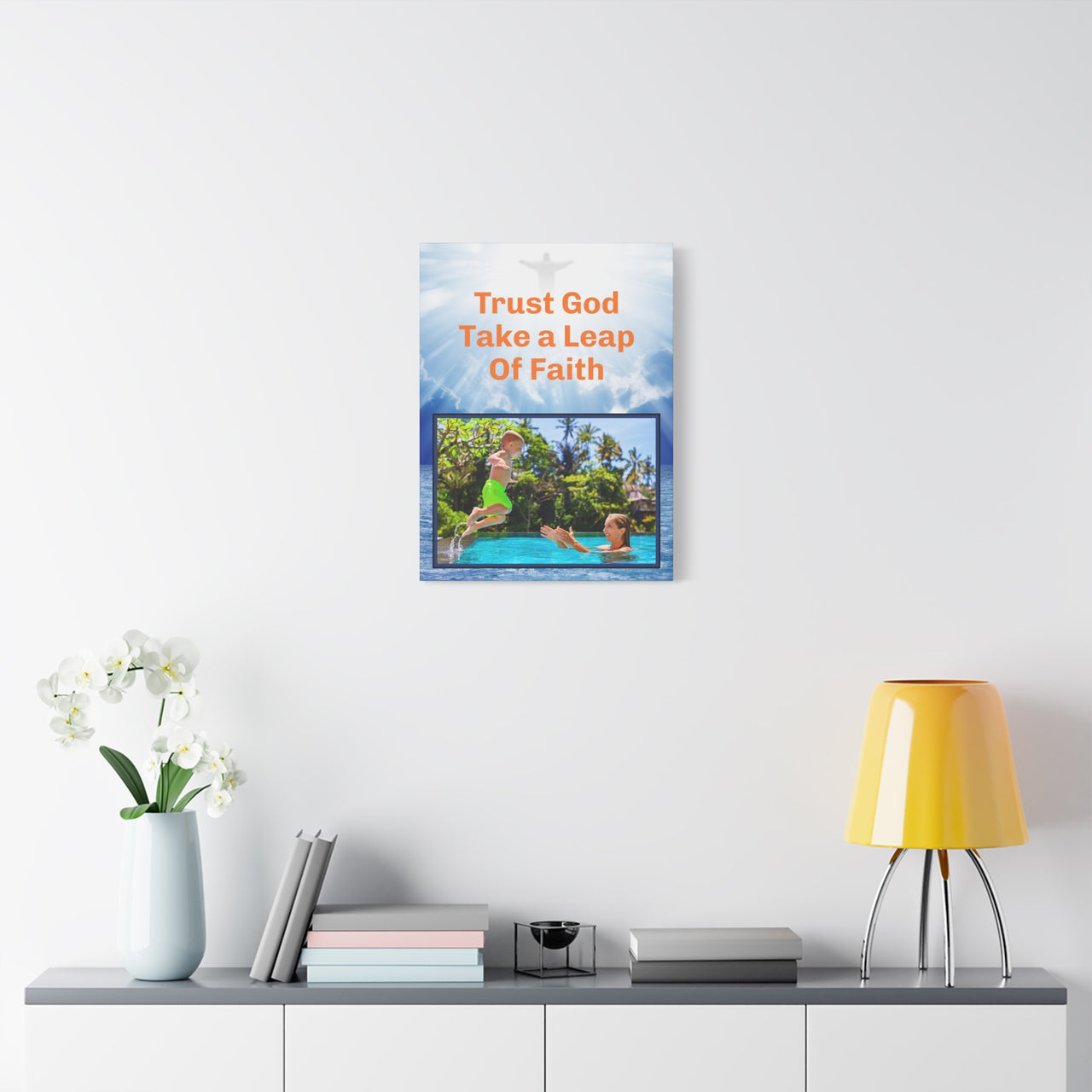 Canvas wall art with “Leap of Faith” design child jumping into pool with the message "Trust God, Take a Leap of Faith," pinewood frame, inspirational décor, ready to hang, 18x24 wall art on wall