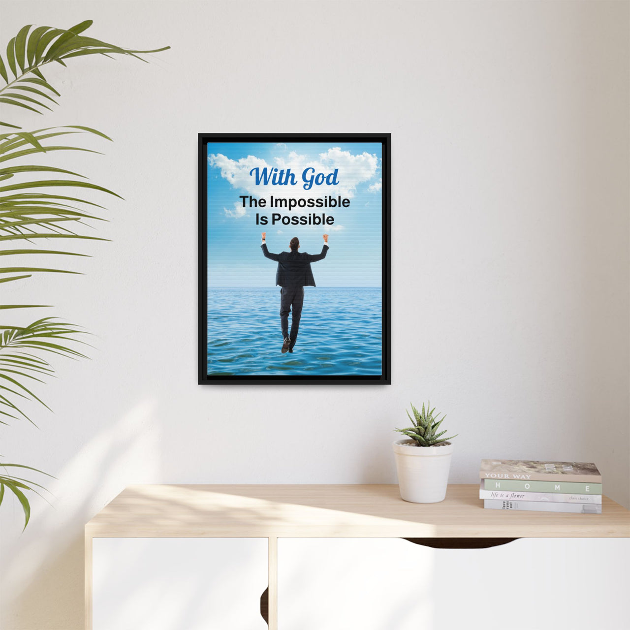 Framed canvas wall art with “Impossible Man” design, man walking on water, faith-based message, black pinewood frame, ready to hang, 18x24 framed wall art on wall