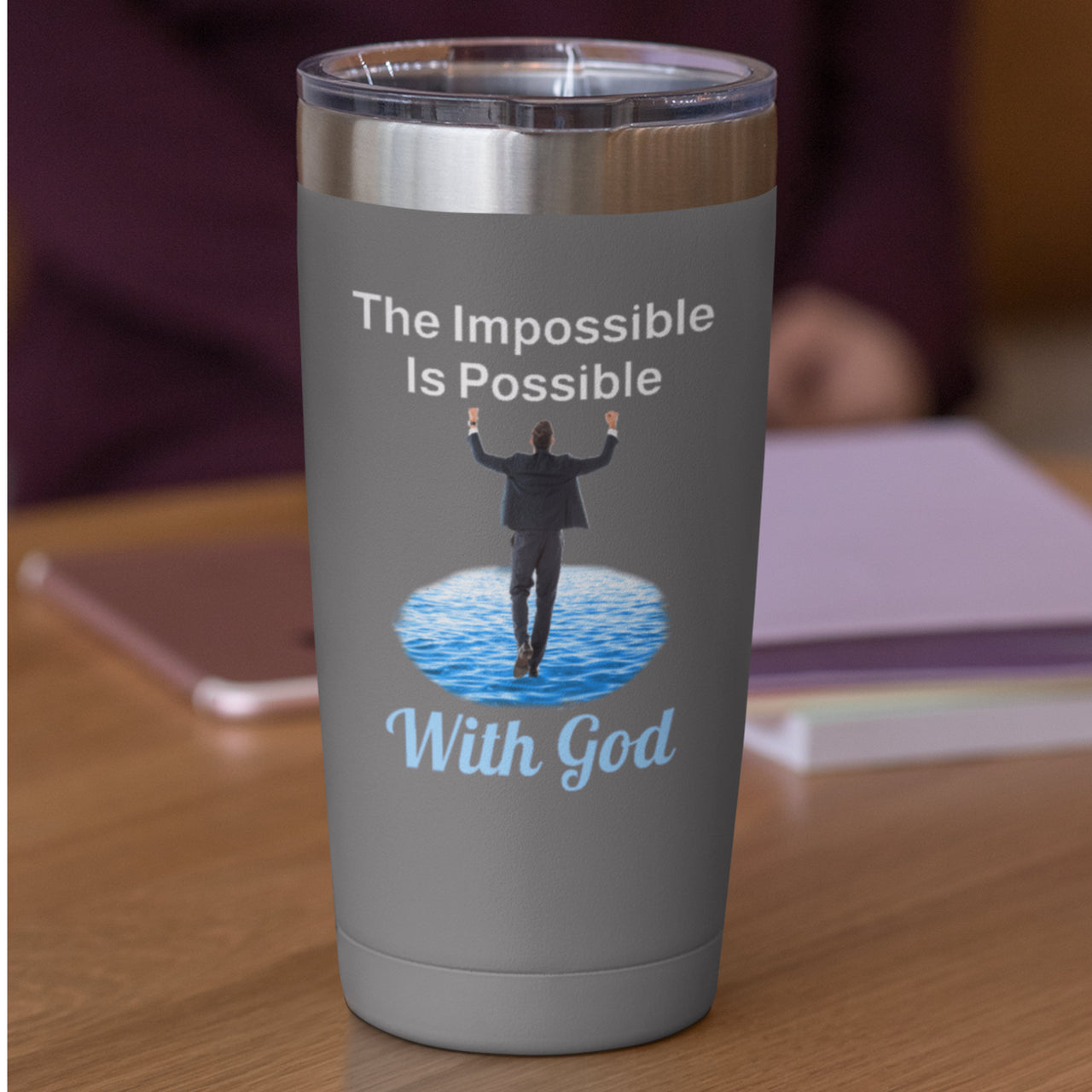 20oz faith-based stainless steel tumbler with "Impossible Man" design, inspirational message “The Impossible Is Possible with God,” leak-proof lid, spiritual drinkware for men walking in purpose, gray tumbler