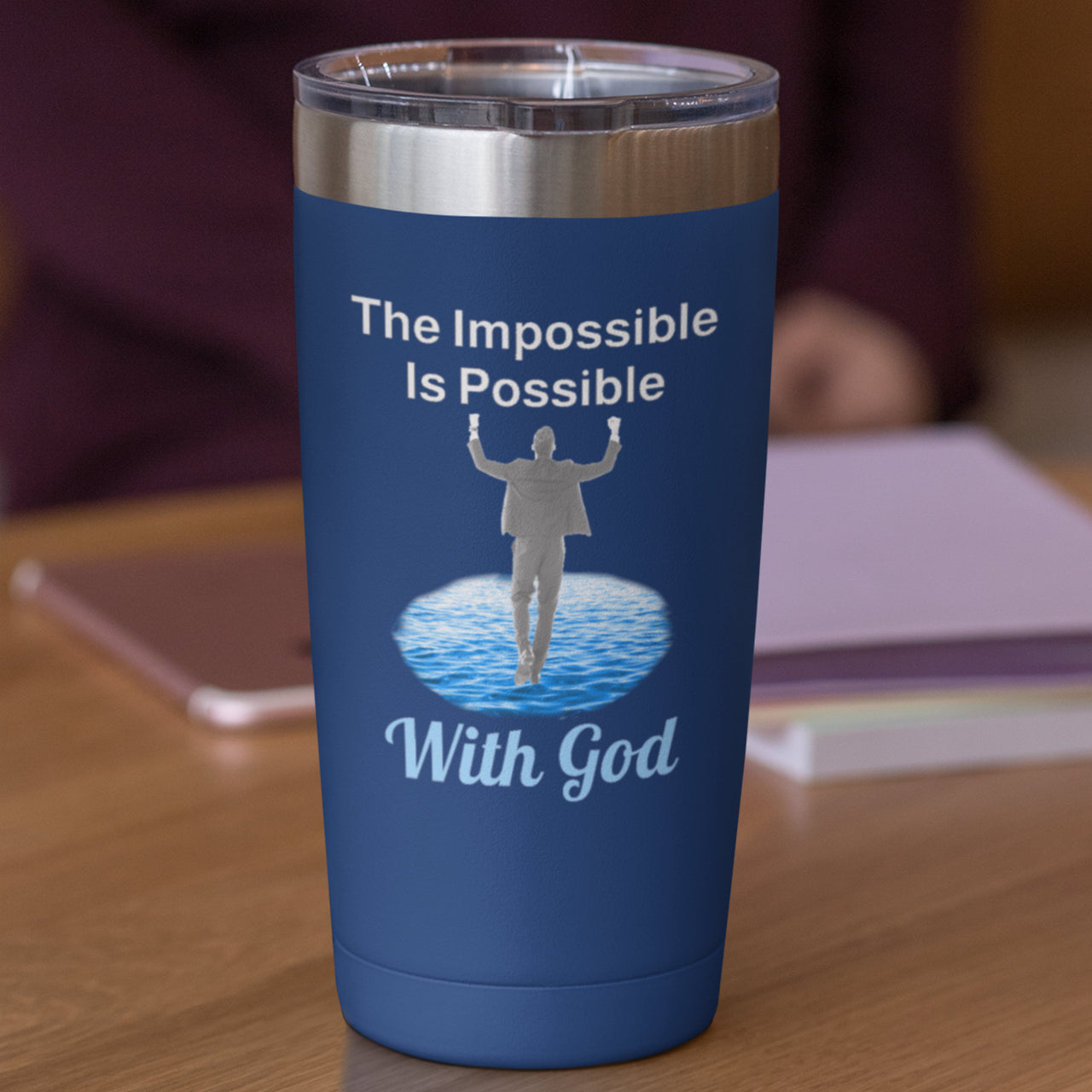 20oz faith-based stainless steel tumbler with "Impossible Man" design, inspirational message “The Impossible Is Possible with God,” leak-proof lid, spiritual drinkware for men walking in purpose, navy blue tumbler