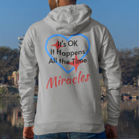Gildan unisex zip-up hoodie with “Miracles Happen” design and uplifting message, Christian apparel made from soft cotton-poly fleece, ideal for cooler weather and faith-inspired comfort, man wearing gray hoodie