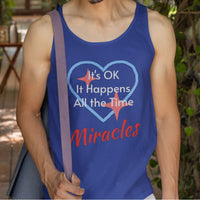 Lightweight Bella+Canvas tank top made from preshrunk cotton with “Miracles Happen” design message, “It’s OK. It Happens All the Time – Miracles,” inspirational apparel encouraging daily miracles through intimacy with God, man wearing blue tank top