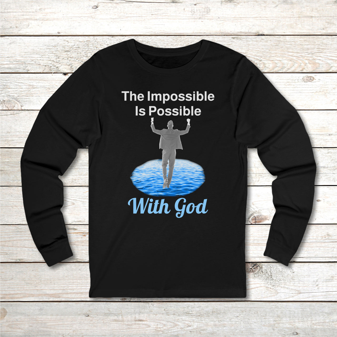 Long-sleeve Bella+Canvas t-shirt made from preshrunk ring-spun cotton with “Impossible Man” design message, “The Impossible Is Possible with God,” inspirational apparel calling believers to step out in faith and trust God for more than they can ask or imagine, front black long-sleeve t-shirt