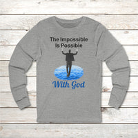 Long-sleeve Bella+Canvas t-shirt made from preshrunk ring-spun cotton with “Impossible Man” design message, “The Impossible Is Possible with God,” inspirational apparel calling believers to step out in faith and trust God for more than they can ask or imagine, front gray long-sleeve t-shirt