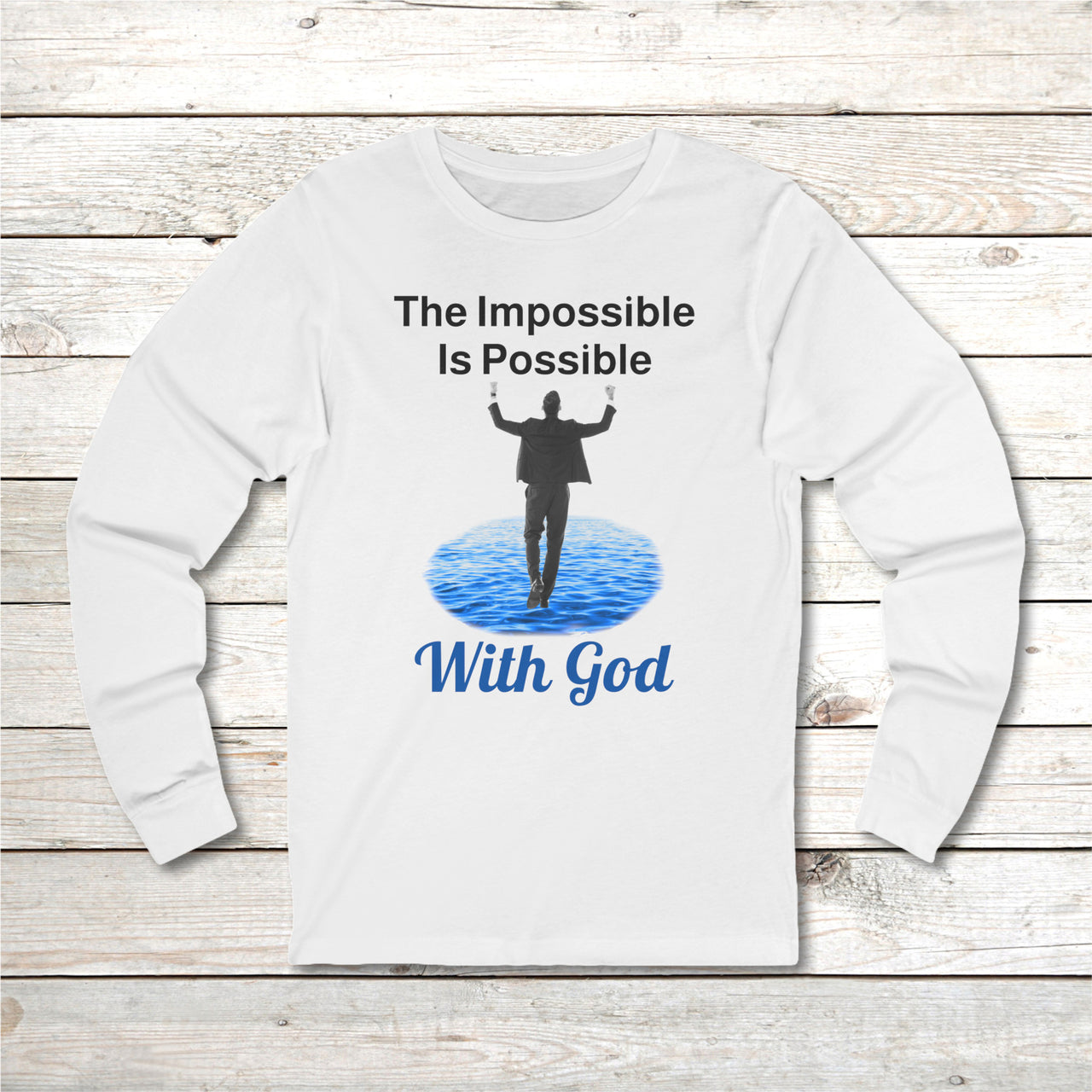 Long-sleeve Bella+Canvas t-shirt made from preshrunk ring-spun cotton with “Impossible Man” design message, “The Impossible Is Possible with God,” inspirational apparel calling believers to step out in faith and trust God for more than they can ask or imagine, front of white long-sleeve t-shirt