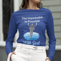 Long-sleeve Bella+Canvas t-shirt made from preshrunk ring-spun cotton with “Impossible Man” design message, “The Impossible Is Possible with God,” inspirational apparel calling believers to step out in faith and trust God for more than they can ask or imagine, woman wearing blue long-sleeve t-shirt