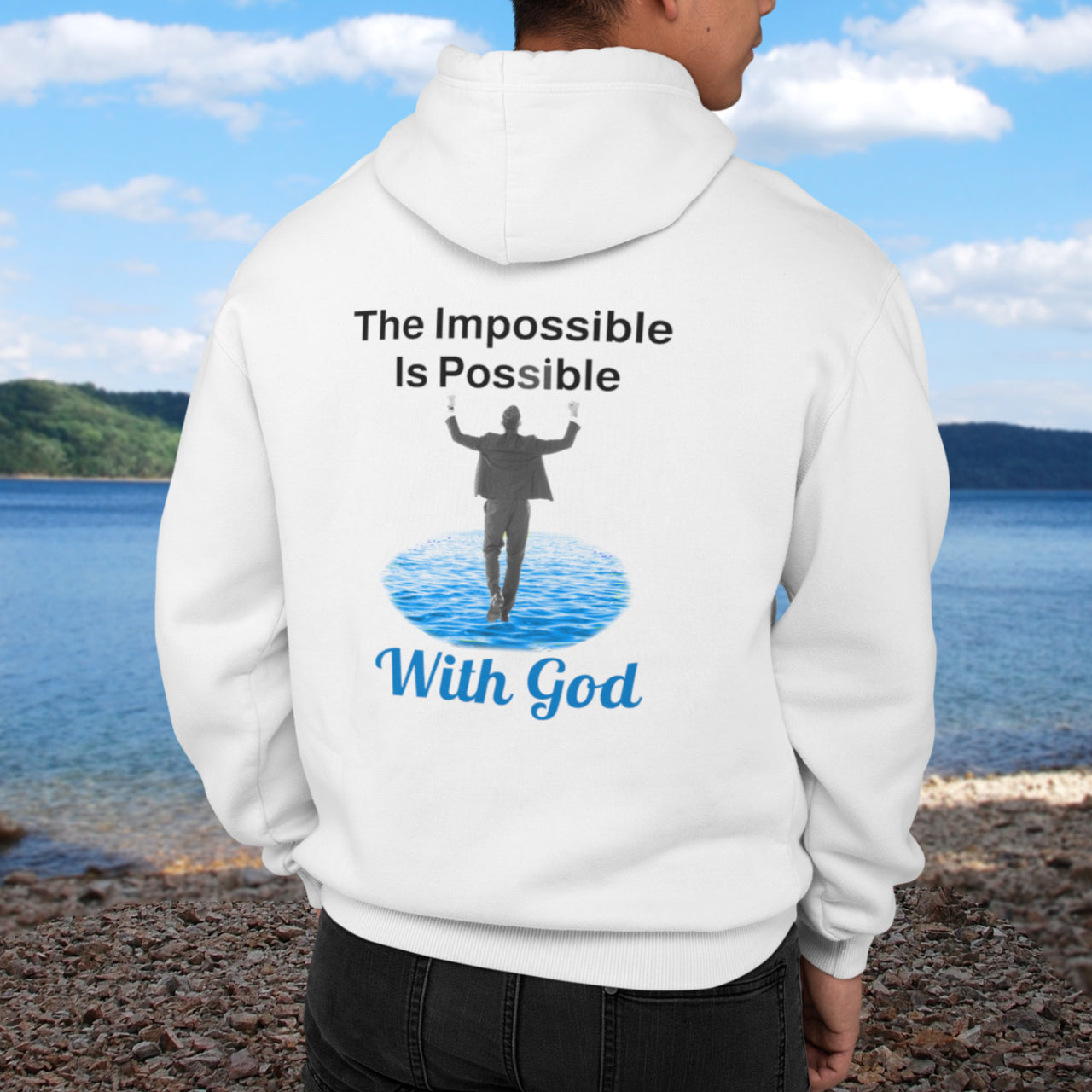 Gildan unisex zip-up hoodie with “Impossible Man” design featuring a man walking on water and uplifting message, Christian apparel made from soft cotton-poly fleece, perfect for cold weather and spiritual encouragement, man in white hoodie