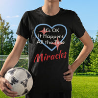 Bella+Canvas youth unisex t-shirt with “Miracles Happen” design and uplifting message, Christian apparel made from soft cotton, ideal for active kids and faith-inspired everyday wear, boy in black t-shirt