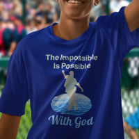 Bella+Canvas youth unisex t-shirt with “Impossible Teen” design featuring a teen walking on water and uplifting message, Christian apparel made from soft cotton, perfect for active wear and spiritual encouragement, boy in blue t-shirt