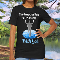Soft, breathable Bella+Canvas t-shirt made from preshrunk cotton with “Impossible Man” design message, “The Impossible Is Possible with God,” inspirational shirt encouraging bold faith to step out and follow God into the impossible, woman in t-shirt - black shirt