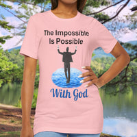 Soft, breathable Bella+Canvas t-shirt made from preshrunk cotton with “Impossible Man” design message, “The Impossible Is Possible with God,” inspirational shirt encouraging bold faith to step out and follow God into the impossible, woman in pink t-shirt