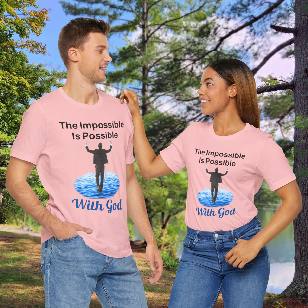 Soft, breathable Bella+Canvas t-shirt made from preshrunk cotton with “Impossible Man” design message, “The Impossible Is Possible with God,” inspirational shirt encouraging bold faith to step out and follow God into the impossible, couple in matching pink t-shirts