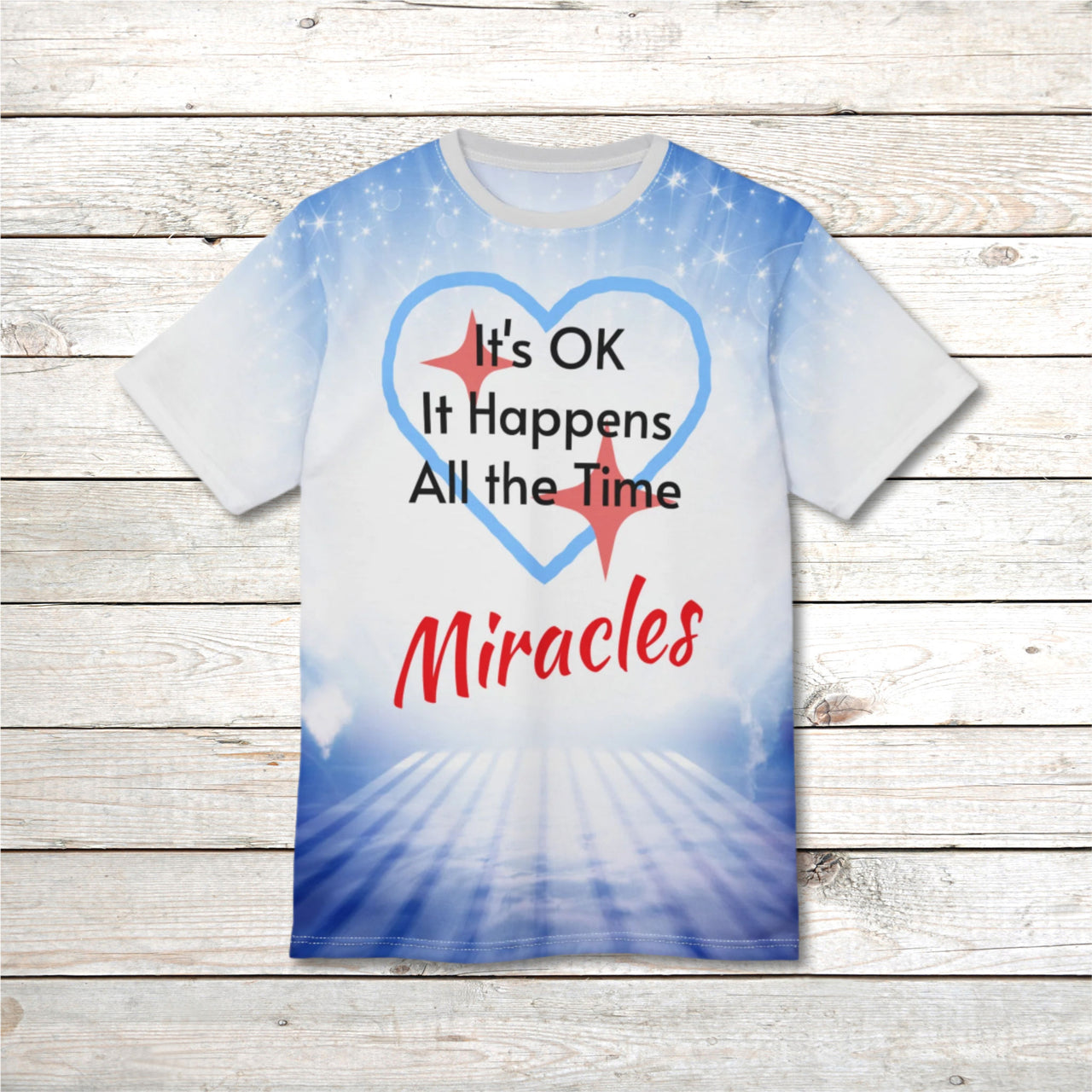 Soft, breathable activewear shirt with “Miracles Happen” design, message “It’s OK. It Happens All the Time – Miracles,” inspirational shirt for expecting God's tangible goodness daily, front of shirt