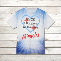 Soft, breathable activewear shirt with “Miracles Happen” design, message “It’s OK. It Happens All the Time – Miracles,” inspirational shirt for expecting God's tangible goodness daily, front of shirt