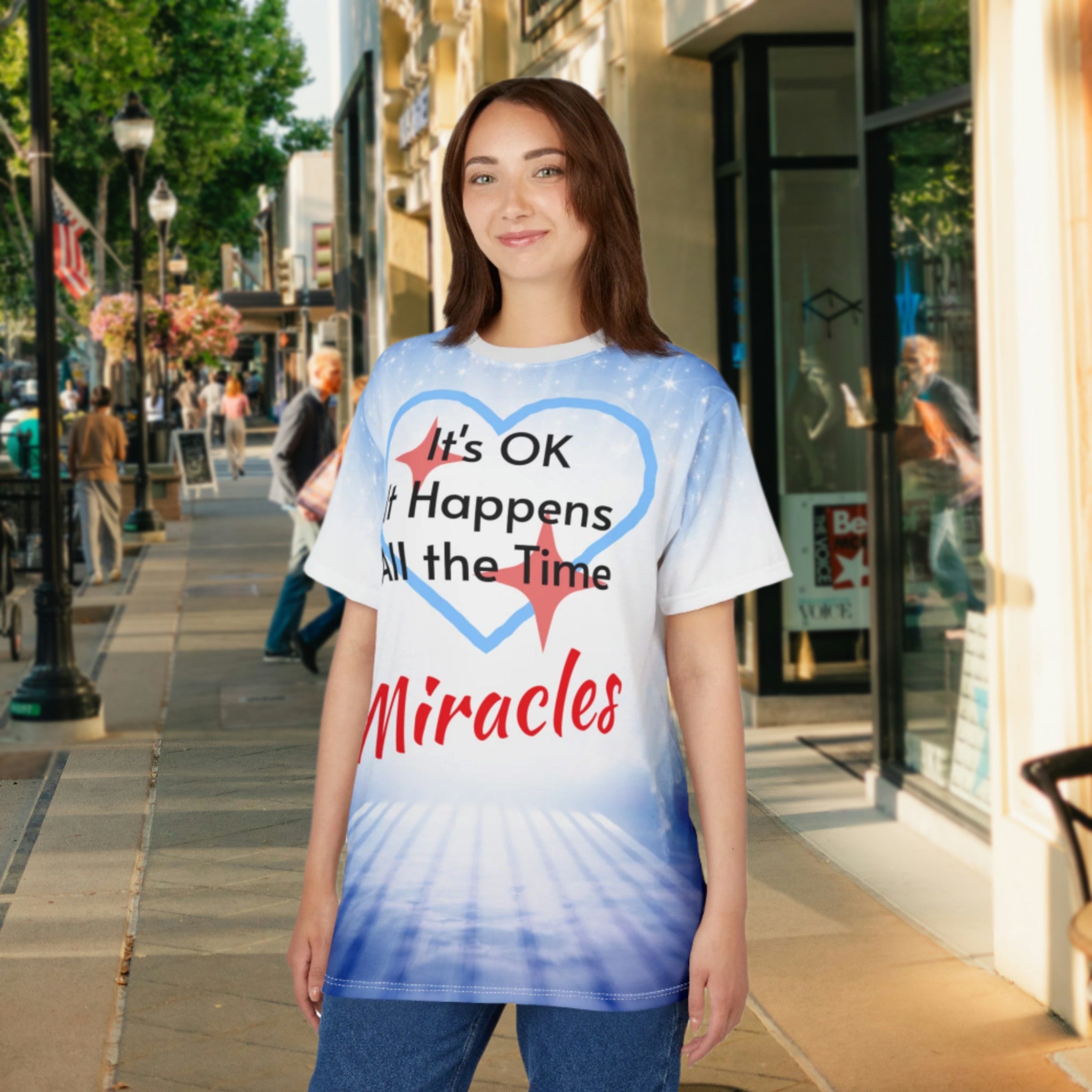 Soft, breathable activewear shirt with “Miracles Happen” design, message “It’s OK. It Happens All the Time – Miracles,” inspirational shirt for expecting God's tangible goodness daily, woman wearing shirt