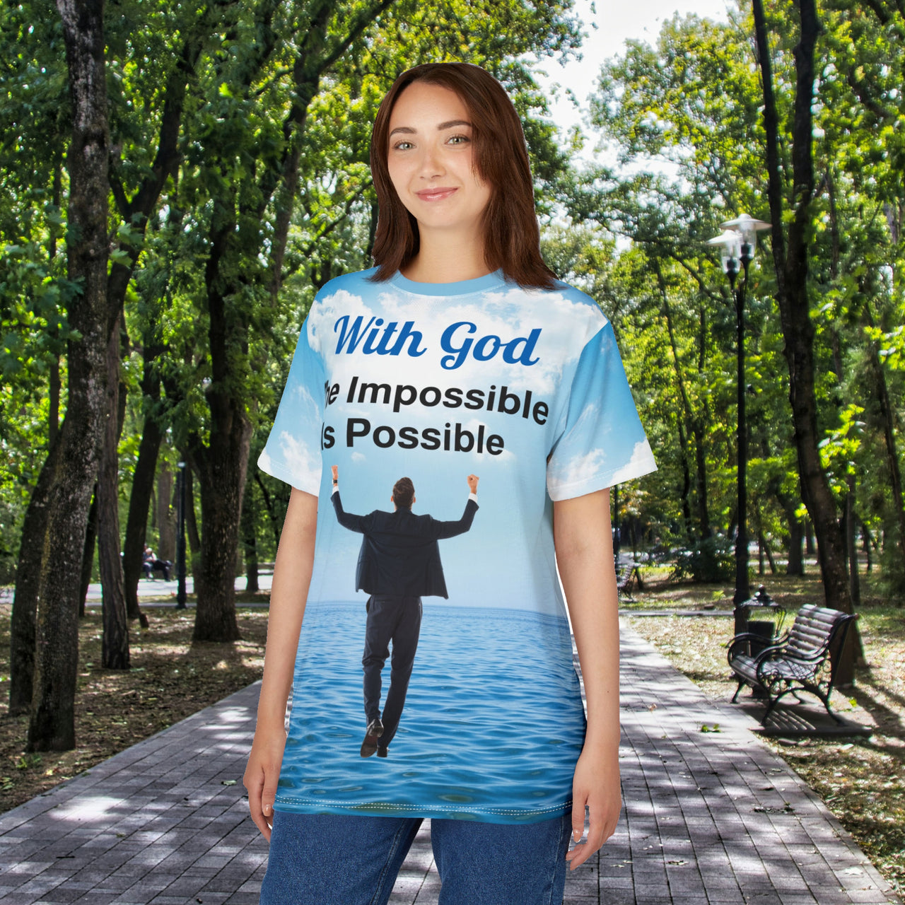 Soft, breathable activewear shirt with “Impossible Man” design, message “The Impossible Is Possible with God,” spiritual shirt for men pursuing God's unexpected possibilities, woman wearing shirt