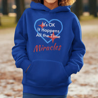 Gildan youth unisex hoodie with “Miracles Happen” design and uplifting message, Christian apparel made from soft preshrunk fleece, ideal for cooler weather and faith-inspired comfort, boy in blue hoodie