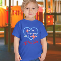 Bella+Canvas toddler t-shirt with “Miracles Happen” design and uplifting message, soft cotton, breathable and durable, Christian apparel for everyday wear and family matching, toddler boy in blue t-shirt