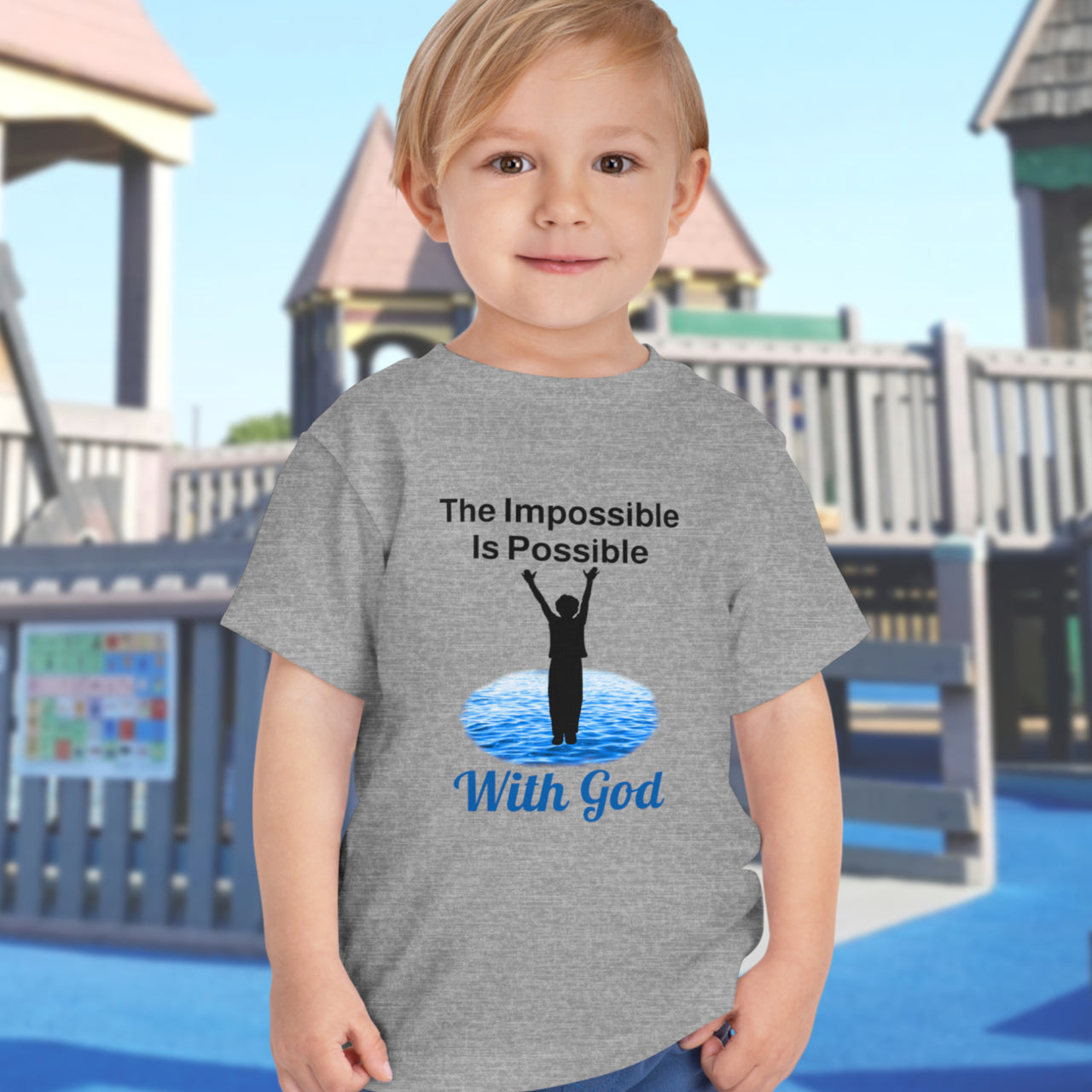 Bella+Canvas toddler t-shirt with “Impossible Toddler” design and faith-filled message, soft cotton, breathable and durable, Christian apparel for active toddlers and family matching, toddler boy in gray t-shirt