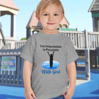 Bella+Canvas toddler t-shirt with “Impossible Toddler” design and faith-filled message, soft cotton, breathable and durable, Christian apparel for active toddlers and family matching, toddler boy in gray t-shirt