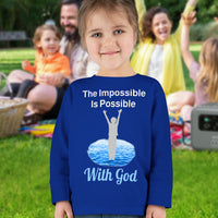 Rabbit Skins toddler long-sleeve t-shirt with “Impossible Toddler” design and faith-filled message, soft cotton, breathable and durable, Christian apparel for active toddlers and spiritual encouragement, toddler girl in blue shirt