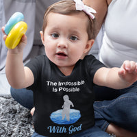 Bella+Canvas baby t-shirt with “Impossible Baby” design and faith-filled message, soft cotton, breathable and durable, Christian apparel for infants and family matching, baby girl in black shirt
