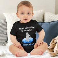 Bella+Canvas baby onesie with “Impossible Baby” design and faith-filled message, soft cotton, envelope neck and snap closure, Christian apparel for infants and spiritual encouragement, baby boy in black onesie