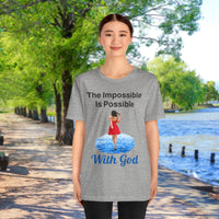 Soft, breathable Bella+Canvas t-shirt made from preshrunk cotton with “Impossible Woman” design message, “The Impossible Is Possible with God,” inspirational shirt encouraging bold obedience and faith-filled movement with God, 2nd woman in gray t-shirt at waterside walkway