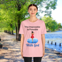 Soft, breathable Bella+Canvas t-shirt made from preshrunk cotton with “Impossible Woman” design message, “The Impossible Is Possible with God,” inspirational shirt encouraging bold obedience and faith-filled movement with God, Asian woman in pink t-shirt at waterside walkway