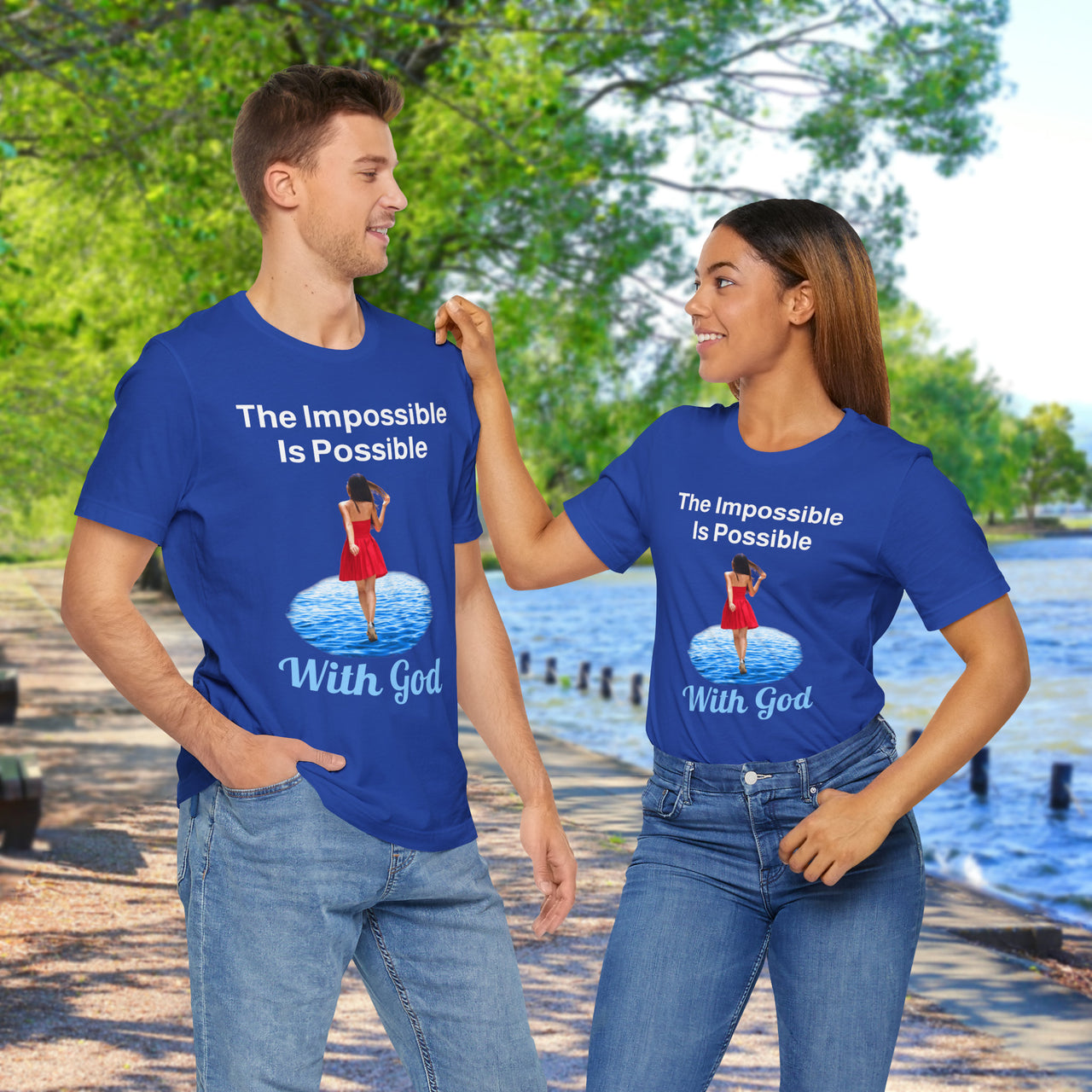 Soft, breathable Bella+Canvas t-shirt made from preshrunk cotton with “Impossible Woman” design message, “The Impossible Is Possible with God,” inspirational shirt encouraging bold obedience and faith-filled movement with God, couple in matching blue t-shirts