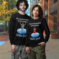 Long-sleeve Bella+Canvas t-shirt made from preshrunk ring-spun cotton with “Impossible Woman” design message, “The Impossible Is Possible with God,” inspirational apparel encouraging women to walk freely in God's incredible ways, couple wearing black long-sleeve t-shirt