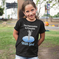 Bella+Canvas youth unisex t-shirt with “Impossible Girl” design featuring a girl walking on water and uplifting message, Christian apparel made from soft cotton, ideal for active wear and faith-forward style, young girl in black t-shirt