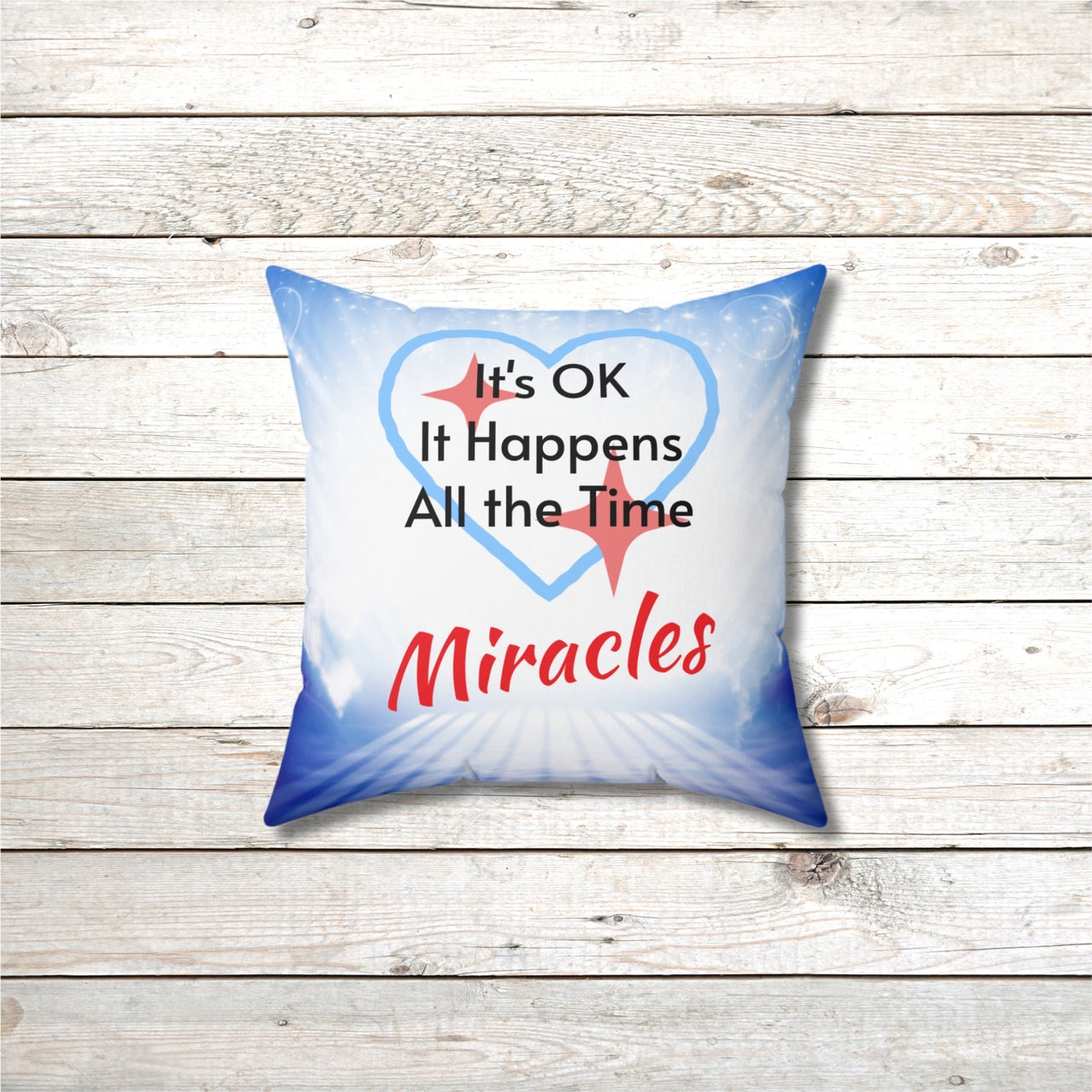 Inspirational throw pillow with “Miracles Happen” design with message "It's OK, It Happens All the Time - Miracle," reversible design, faith-based home décor, white or blue back, spun polyester, 4 sizes, 14x14 front