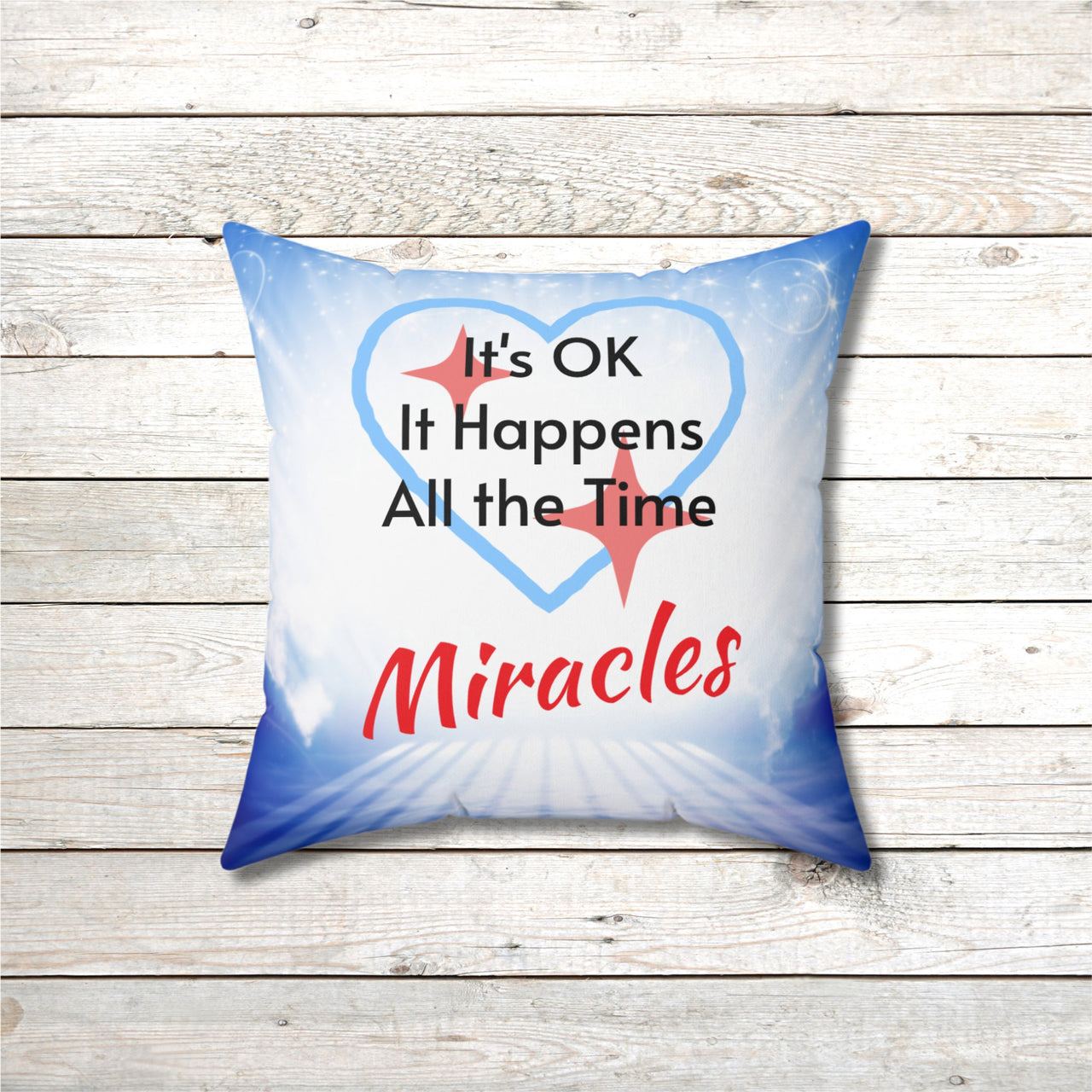 Inspirational throw pillow with “Miracles Happen” design with message "It's OK, It Happens All the Time - Miracle," reversible design, faith-based home décor, white or blue back, spun polyester, 4 sizes, 16x16 front