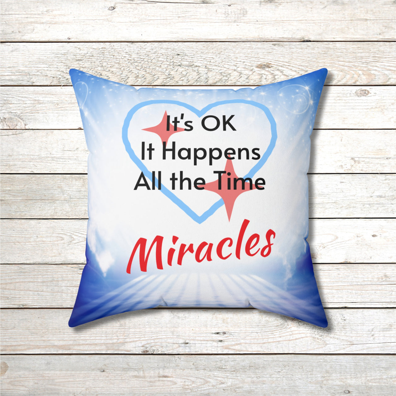 Inspirational throw pillow with “Miracles Happen” design with message "It's OK, It Happens All the Time - Miracle," reversible design, faith-based home décor, white or blue back, spun polyester, 4 sizes, 18x18 front