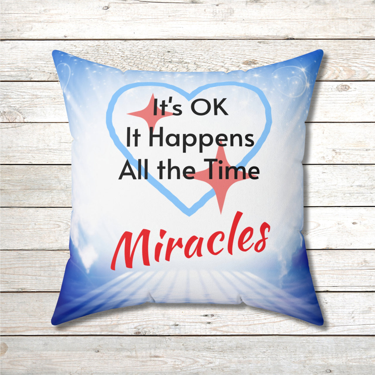 Inspirational throw pillow with “Miracles Happen” design with message "It's OK, It Happens All the Time - Miracle," reversible design, faith-based home décor, white or blue back, spun polyester, 4 sizes, 20x20 front