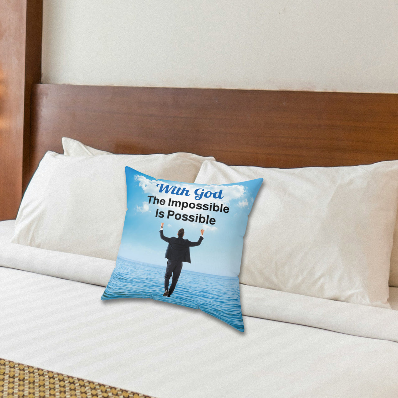 Faith-based throw pillow with “Impossible Man” design, man walking on water, inspirational message "With God, The Impossible Is Possible," inspirational home décor, reversible with white or sea blue back, spun polyester, 4 sizes, 14x14 on bed