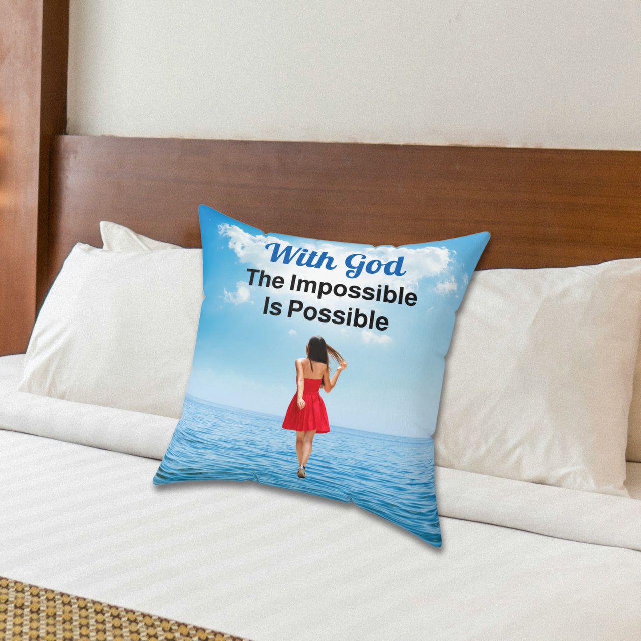 Inspirational throw pillow with “Impossible Woman” design, woman walking on water, spiritual message "With God, The Impossible Is Possible," faith-based home décor, reversible with sea blue back, spun polyester, 4 sizes, 18x18 on bed