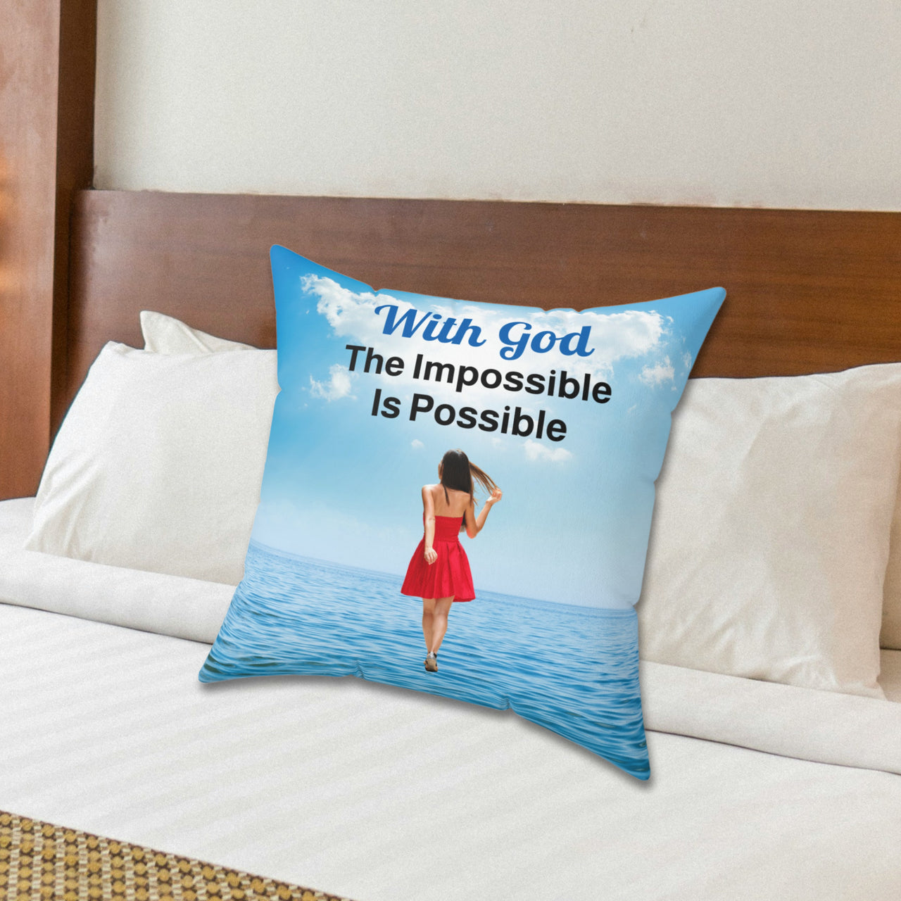 Inspirational throw pillow with “Impossible Woman” design, woman walking on water, spiritual message "With God, The Impossible Is Possible," faith-based home décor, reversible with sea blue back, spun polyester, 4 sizes, 20x20 on bed