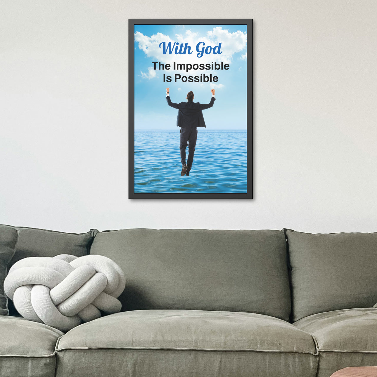 Black wood framed inspirational poster with “Impossible Man” design, man walking on water with the message "With God, The Impossible Is Possible," semi-gloss finish, shatter-proof plexiglass, available in 3 sizes, 24x36 framed poster on wall