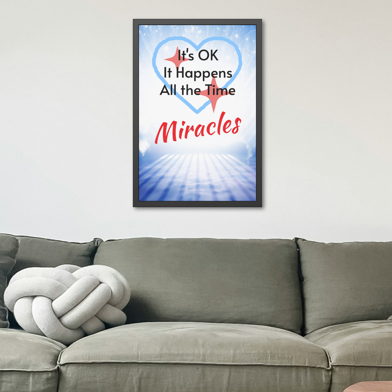 Black wood framed inspirational poster with “Miracles Happen” design with the message "It's Ok, It Happens All the Time - Miracles," semi-gloss finish, shatter-proof plexiglass, available in 3 sizes, faith-inspired wall art, 24x36 framed poster