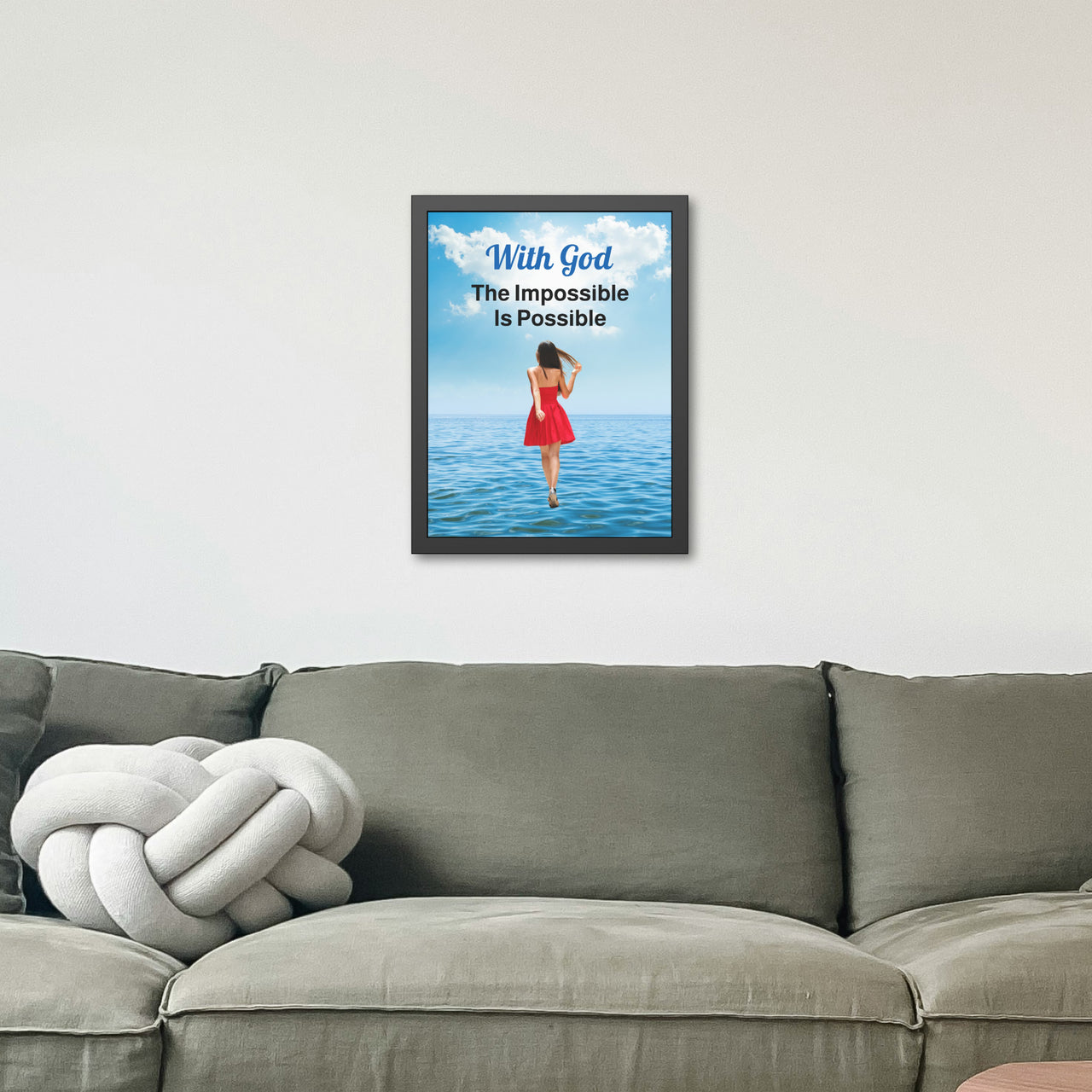 Black wood framed inspirational poster with “Impossible Woman” design, woman walking on water with the message "With God, The Impossible Is Possible," semi-gloss finish, shatter-proof plexiglass, available in 3 sizes, 18x24 framed poster on wall