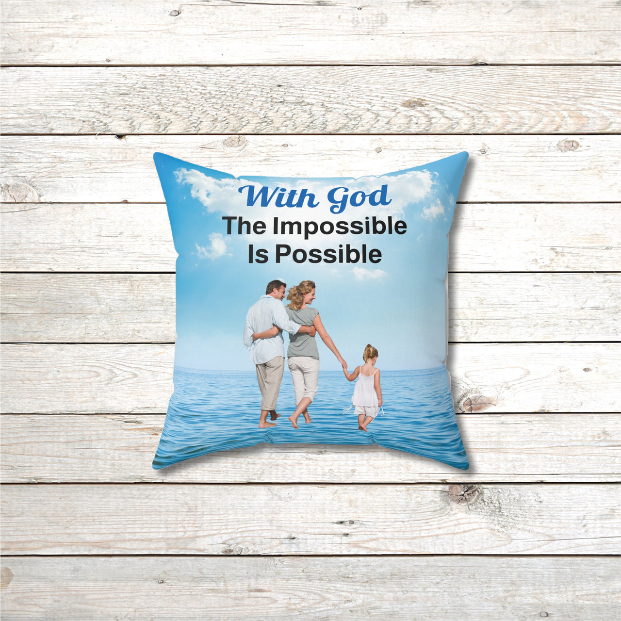 Faith-based throw pillow with “Impossible Family” design, family walking on water with message "With God, The Impossible Is Possible," inspirational home décor, reversible with white or sea blue back, spun polyester, 4 sizes, 14x14 front