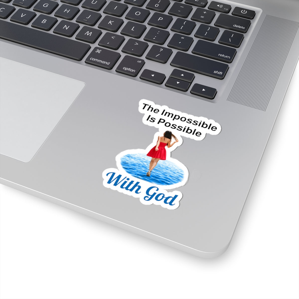 Sheet of 4 vinyl stickers with “Impossible Woman” design, message “The Impossible Is Possible with God,” glossy finish, inspirational stickers for adventurous women to make the impossible their reality, 3-inch sticker on laptop